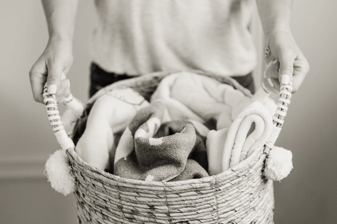 Folded blankets in a basket